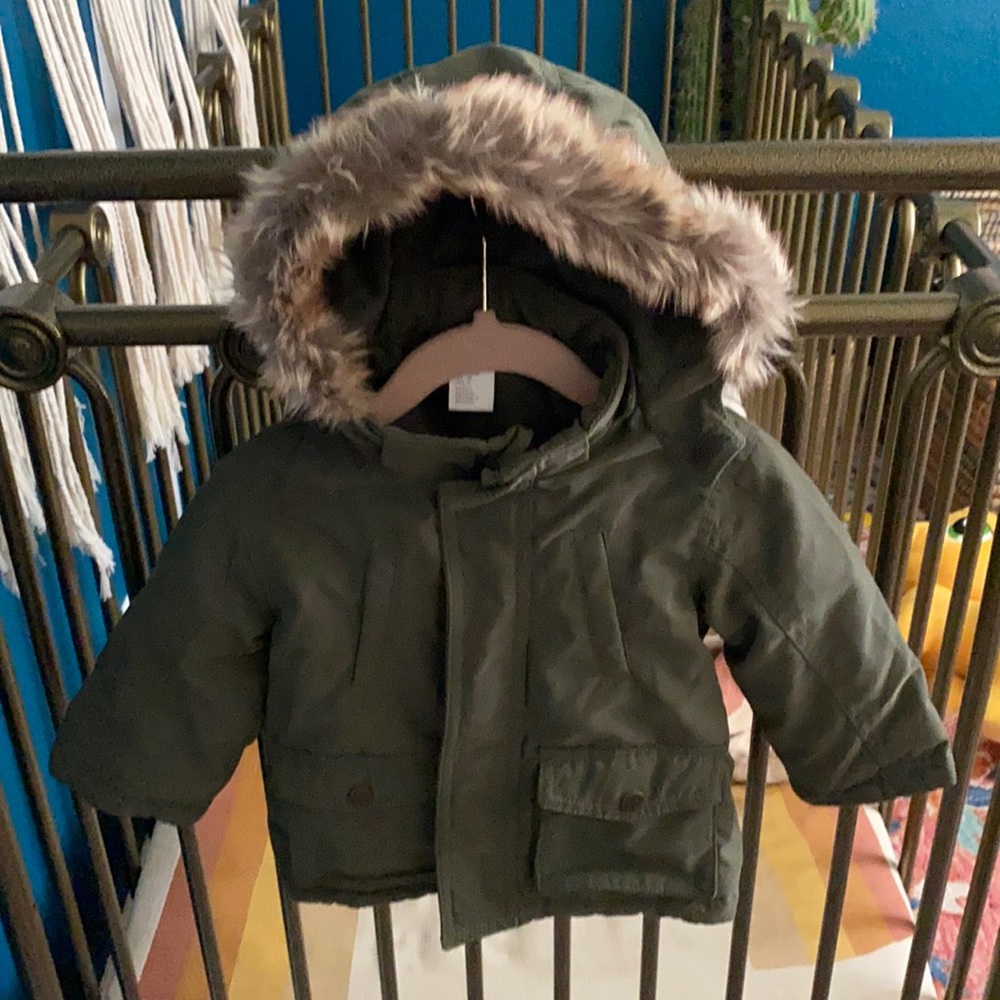 Coat with fur lined hood